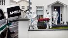 The body of a man is taken from a house in Beechpark Avenue, Castleknock, Dublin on Sunday. Photograph: Dara Mac Dónaill/The Irish Times