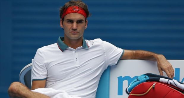 Roger Federer of Switzerland rests between games during his match against Teymuraz Gabashvili 