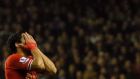Liverpool’s Luis Suarez reacts after a missed opportunity  against Aston Villa. Photograph: Phil Noble/Reuters 