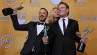 Breaking Bad actors Bryan Cranston (R), Anna Gunn (C) and Aaron Paul (L) hold awards at the 20th Annual Screen Actors Guild Awards. Photograph: Paul Buck/EPA 
