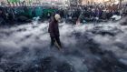 Pro-European integration protesters gather at the site of clashes with riot police in Kiev on Thursday. Photograph: Reuters