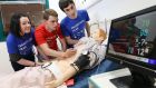 From left Elizabeth Moylan (15) from Manor House, Raheny, Dublin, Lee Sherlock,(16) from Marian College, Ringsend, Dublin and Patrick Murphy (16) from St Benildus College, Kilmacud, Dublin take part in the RCSI Transition Year (TY) MiniMed programme in Beaumont Hospital.