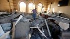 A man walks over rubble inside the Islamic Art Museum after a bomb attack in downtown Cairo today. Photograph: Mohamed Abd El Ghany/Reuters