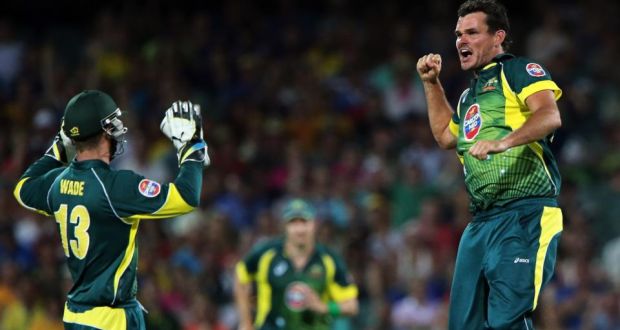 Matthew Wade celebrates a wicket with Nathan Coulter-Nile of Australia during  the one-day international against England at the Adelaide Oval. Photograph: by Daniel Kalisz/Getty Images