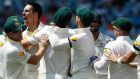 Australia’s Mitchell Johnson  celebrates with team-mates after the dismissal of South Africa’s captain Graeme Smith during the second day of the first Test match in Centurion, South Africa. Photograph: Siphiwe Sibeko/Reuters 