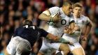  Scotland’s Sean Lamont tackles England’s Luther Burrell  during the RBS Six Nations fixture at Murrayfield from which England emerged victorious. Photograph: EPA/Graham Stuart