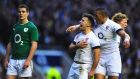 Ireland’s Johnathan Sexton watches on as England scrumhalf Danny Care celebrates after scoring his side’s only try at Twickenham.