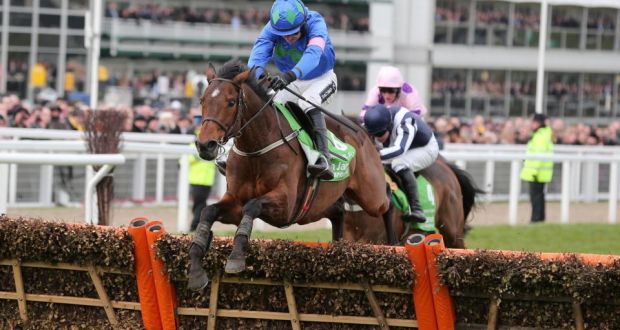 Hurricane Fly, ridden by Ruby Walsh, regains his Stan James Champion Hurdle crown at last year’s Cheltenham Festival.