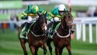 Barry Geraghty riding Jezki (left) win the Champion Hurdle from My Tent Or Yours and Tony McCoy. Photograph:Alan Crowhurst/Getty Images