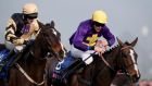 Lord Windermere, ridden by Davy Russell, beats On his Own, ridden by David Casey, to win the Cheltenham Gold Cup. Photograph: Dan Sheridan/Inpho