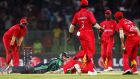 Ireland’s Stuart Thompson lies on the ground after making his ground to secure the bye that gave Ireland a three-wicket win over Zimbabwe at the ICC World Twenty20 in Sylhet, Bangladesh. Photograph: Surjeet/Inpho