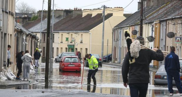 Householders react to flooding earlier this year. Photograph: Patrick Browne