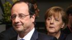French President Francois Hollande and German Federal Chancellor Angela Merkel at the start of spring European head of states Summit at EU council headquaters in Brussels, Belgium on Thursday. Photograph: EPA