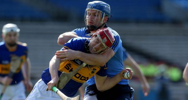 Tipperary’s Michael Cahill is challenged by Dublin’s  Conal Keaney during the Allianz Hurling League Division 1A game at Semple Stadium in  Thurles. Photograph: Donall Farmer/Inpho
