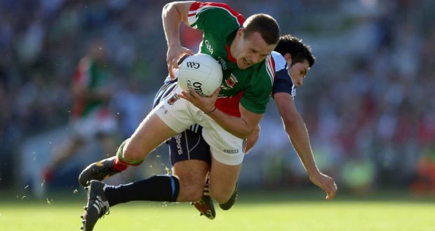 Andy Moran of Mayo and Cian O’Sullivan of Dublin clash during last year’s All-Ireland football final at Croke Park. The two sides will meet at the same venue for Saturday evening’s NFL clash. Photograph: Donall Farmer/Inpho