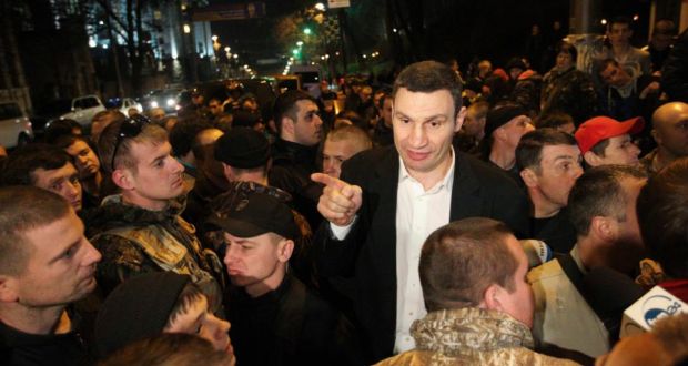 Ukrainian Democratic Alliance for Reform (UDAR) party leader Vitaly Klitschko (C) addresses activists of the Right Sector movement. He has said he will not run for the presidency. Photograph: Valentyn Ogirenko/Reuters.