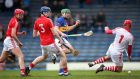 Tipperary’s John O’Dwyer scores his side’s third goal past goalkeeper Anthony Nash of Cork at Semple Stadium. Photo: James Crombie/Inpho