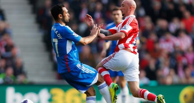  Ahmed Elmohamady of Hull City challenges Stephen Ireland of Stoke City during the  Premier League match  at the Britannia Stadium. Photograph: Paul Thomas/Getty Images