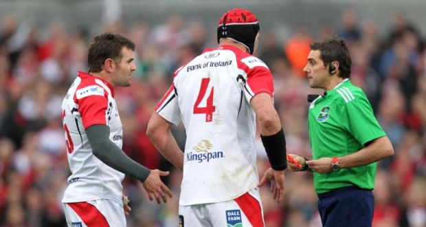 Referee Jerome Garces shows Jared Payne a red card after just four minutes of the Heineken Cup quarter-final against Saracens at Ravenhill. Photo: Darren Kidd/Inpho