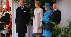 Duke of Edinburgh Prince Philip, Sabina Higgins, Queen Elizabeth and President Michael D Higgins watch a ceremonial welcome at Windsor Castle yesterday. Photograph: Peter Macdiarmid/Getty Images