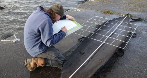 A researcher painstakingly documents one of the Lough Corrib finds.
