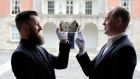 Goldsmiths Se O’Donoghue and Lee Harding of Da Capo jewellers unveil the Brian Boru millennium crown  at Dublin Castle yesterday. Photograph: Dave Meehan
