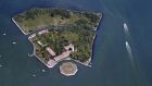      Poveglia, the overgrown and deserted 17-acre island off the coast of Italy. Photograph: Getty Images 