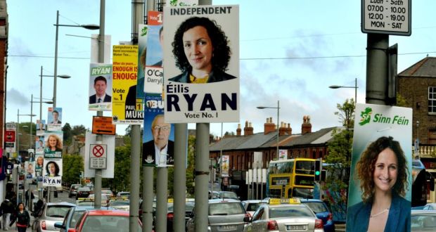 Election posters in Dublin; one candidate had to remove a poster covering traffic lights on Custom House Quay. Photograph: David Sleator/The Irish Times