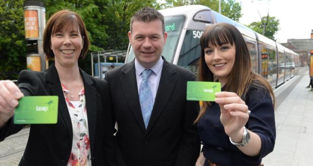 Minister of State for Public Transport Alan Kelly with Wendy Twomey (left) from Raheny and Ciara Harte from Rush at the Stephen’s Green Luas stop in Dublin today. Photograph: Cyril Byrne/The Irish Times
