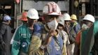South African miners: the National Union of Mineworkers believes that up to 50,000 miners may have contracted an incurable lung disease from severe dust build-ups in mine shafts. photograph: gianluigi guercia/afp/getty images