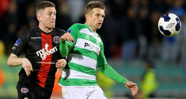 Shamrock Rovers’ Stephen McPhail and Craig Walsh of Bohemians battle for the ball. Photograph: Cathal Noonan/Inpho