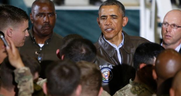 President Barack Obama shakes hands with troops after delivering remarks at Bagram Air Base in Kabul today. Photograph: Reuters   