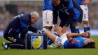 Italy’s Riccardo Montolivo  receives medical attention after breaking his leg at Craven Cottage last night. Photograph: Toby Melville/Reuters