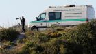 Portuguese police search scrubland in Praia da Luz, Portugal, as British police investigating the disappearance of Madeleine McCann in Portugal have reportedly arrived at the potential excavation site near where the young girl vanished seven years ago. Photograph: Luis Forra/PA Wire 