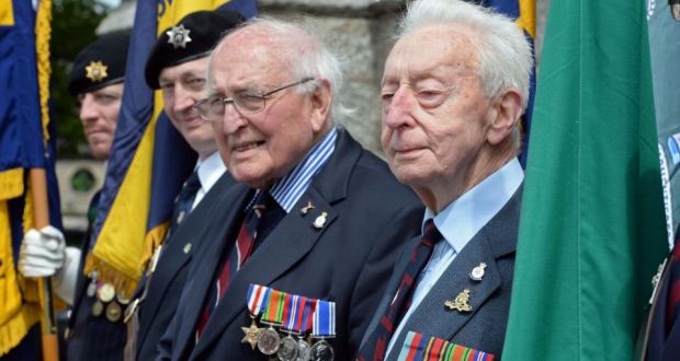 Albert Sutton, (RAF), left, and Ken McLean, (Royal Artillery) with standard bearers at the commemoration service for those who served in World War II, at Monkstown Parish Church, Co. Dublin. Photograph: Eric Luke/The Irish Times