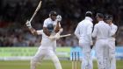 Kumar Sangakkara of Sri Lanka celebrates reaching his century with teammate Mahela Jayawardena during day three of the first  Test against England  at Lord’s. Photograph: Gareth Copley/Getty Images