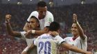 Charles Aranguiz of Chile (centre) celebrates with his team-mates after scoring to put his side 2-0 up against Spain in the  Group B  match at the  Maracana in Rio de Janeiro. Photograph: Antonio Lacerda/ EPA