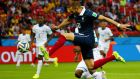 France’s Karim Benzema scores against Honduras during the opening game in Group E.