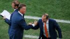 Netherlands coach Louis van Gaal celebrates with his assistant Danny Blind after the first goal   against Chile during the World Cup Group B  match in Sao Paulo. Photograph:  Paulo Whitaker/Reuters