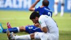 Luis Suarez of Uruguay and Giorgio Chiellini of Italy   after a clash in which the latter claims he was bitten.  Photograph:   Matthias Hangst/Getty Images