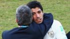 Head coach Oscar Tabarez of Uruguay hugs Luis Suarez after their  1-0 victory over Italy  at Estadio das Dunas  in Natal, Brazil. Photograph:  Julian Finney/Getty Images