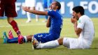 Uruguay’s Luis Suarez has been banned for nine matches and from all football for four months after biting Italy’s Giorgio Chiellini. Photograph:  Tony Gentile/Reuters 
