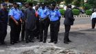 Nigeria’s president Goodluck Jonathan (4th left) visits the scene of a bomb blast that occurred on Wednesday at the business district in Wuse 2 in Abuja. Photograph: Stringer/Reuters. 