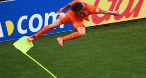 Klaas-Jan Huntelaar of the Netherlands celebrates scoring the winner against Mexico in the second round of the  World Cup at Castelao   in Fortaleza, Brazil. Photograph:  Jamie McDonald/Getty Images