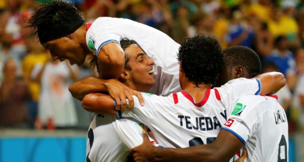 Costa Rica’s Bryan Ruiz (left) celebrates his goal with team-mates  at the Pernambuco Arena in Recife. Photograph: Yves Herman / Reuters 