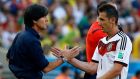 Good job . . . Germany’s Miroslav Klose is congratulated by coach Joachim Löw after their victory over France at the Maracanã in Rio de Janeiro. Photograph: Kai Pfaffenbach/Reuters