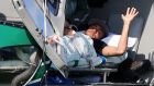Injured Brazilian national soccer team player Neymar waits to be airlifted home from Brazil’s training camp inTeresopolis, near Rio de Janeiro. Marcelo Regua/Reuters  