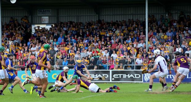 Clare’s Seádna Morey scores a goal for during the final moments of regulation time in the All-Ireland Hurling Qualifier against Wexford at Cusack Park in Ennis. Photograph: Cathal Noonan/Inpho