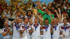 Germany’s Bastian Schweinsteiger lifts the World Cup trophy after the 2014 final between Germany and Argentina at the Maracana in Rio de Janeiro. Photograph: Kai Pfaffenbach / Reuters 