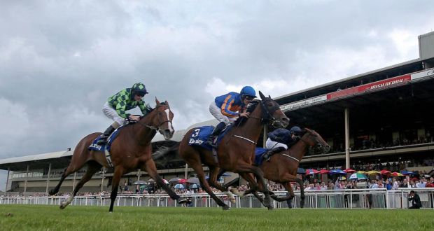 Bracelet, ridden by Colm O’Donoghue, comes home to win the Darley Irish Oaks at the Curragh. Photograph: Donall Farmer/Inpho